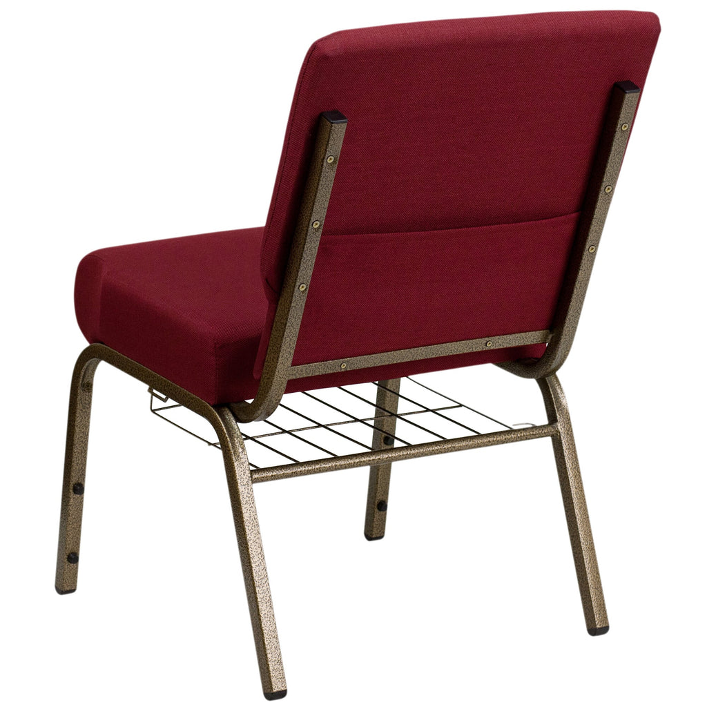 A burgundy church chair with a gold metal frame and book rack.