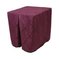 Square portable memorial display table in Carlisle Plum, with a fitted fabric cover and skirt extending around all sides.