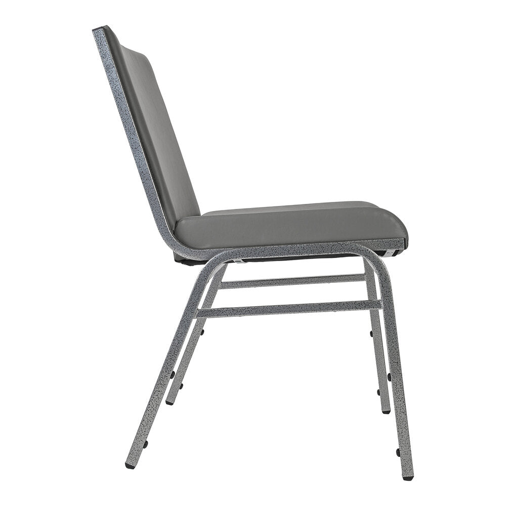 A side view of a gray chair with a cushioned seat and backrest, supported by a metal frame with four legs.