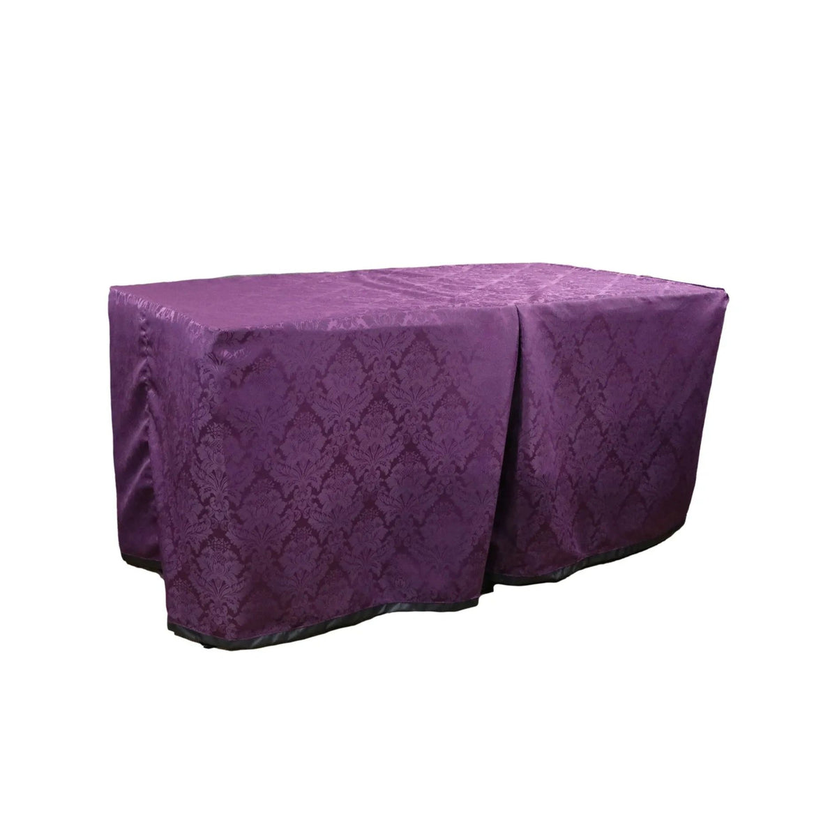 Carlisle Plum cover fitted over a rectangular folding table, with a full-length skirt and overlapping front panels.