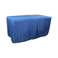 Williston Cobalt cover fitted over a rectangular folding table, with a full-length skirt and overlapping front panels.