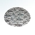 Circular lace veil shown on a blue-gray background