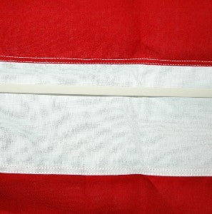 Detail of white veteran flag holder supporting a flag